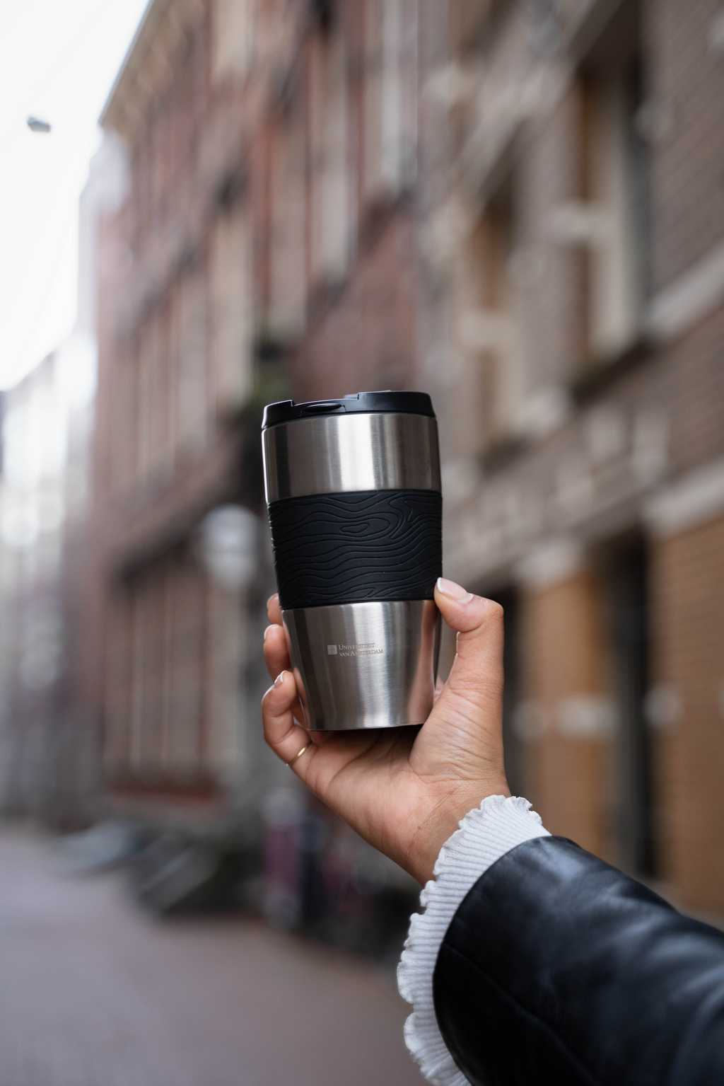 Stainless steel thermos cup with the University of Amsterdam logo